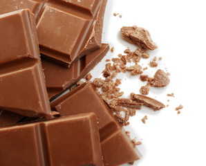 Broken chocolate bar on white background