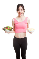 Beautiful Asian healthy girl salad and potato chips.