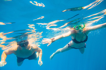 Fototapeta na wymiar Young Couple Snorkeling