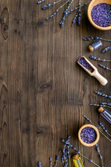 organic cosmetics with lavender on wooden background top view