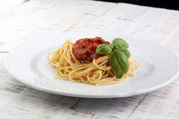 Plate of delicious spaghetti Bolognaise or Bolognese with savory