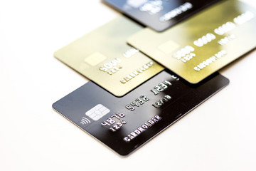 pile of credit cards on white background