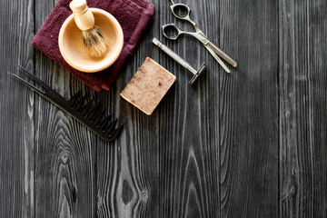 Tools for cutting beard barbershop top view on wooden background