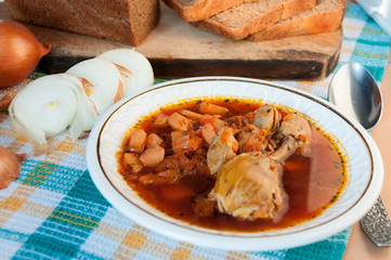 For lunch, chicken soup with beetroot and black bread