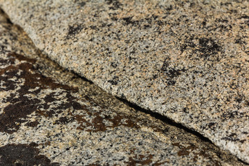 Closeup of granite covered in black lichen in California's high sierra