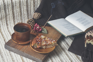 Pie, tea, book and Incense stick. Aromatherapy