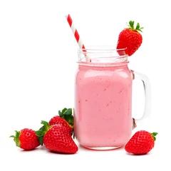 Papier Peint photo Lavable Milk-shake Pink strawberry smoothie in a mason jar glass with straw and scattered berries isolated on white