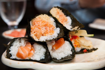 Salmon Hand roll sushi in a restaurant