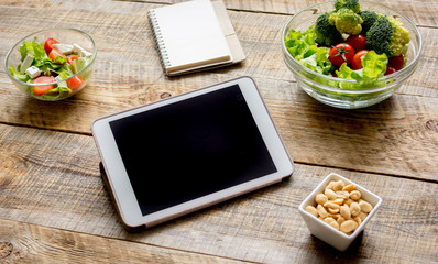 concept diet and tablet with vegetables mock up
