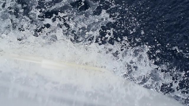 Waves of board closeup. Regatta. Adventures in the ocean. Slow motion.