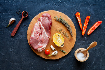 concept cooking meat steak on dark background top view