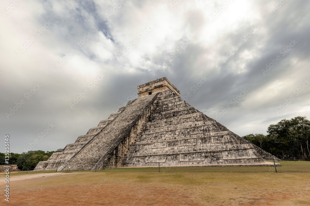 Wall mural el castillo, a.k.a the temple of kukulkan, a mesoamerican step-pyramid at the center of the chichen 