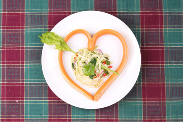 Sausage cheese in heart style with spicy green mango salad.