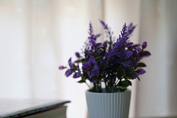 Flower vase on window soft focus background. vintage flower vase and curtain background