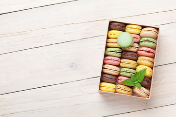 Colorful macaroons in a gift box