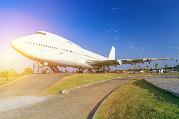 Public airplane landing on runway.