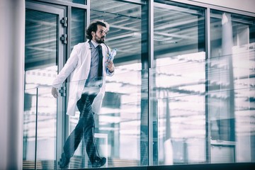Doctor rushing in corridor