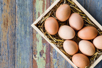 Chicken eggs in wood box