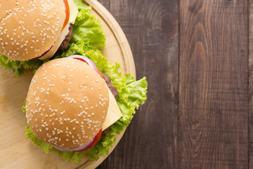 Top view bbq hamburger on the wooden background