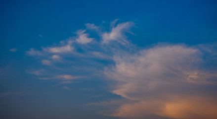 Naklejka na ściany i meble Nice clouds at sunset time