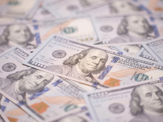 One hundred dollar bills. Inflation. Deflation. Worth. Trades. Economy. Benjamin Franklin money. Currency. 