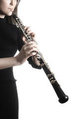 Oboe player. Hands playing woodwind musical instruments