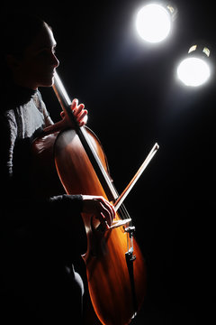 Cello player cellist playing violoncello