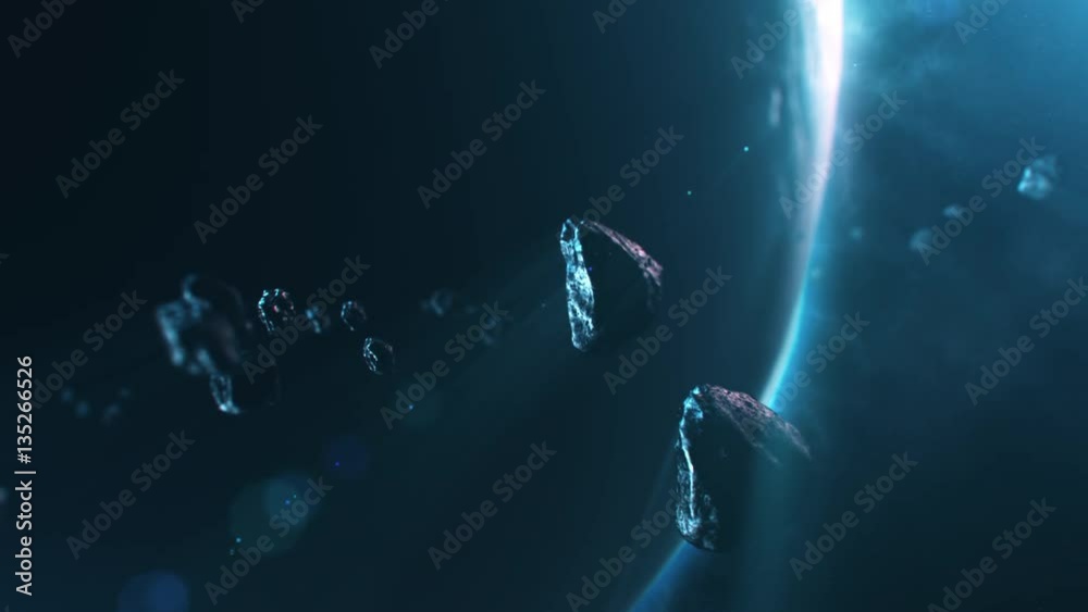 Wall mural 3d animation of asteroids flying through solar system with planet and blue light in the background