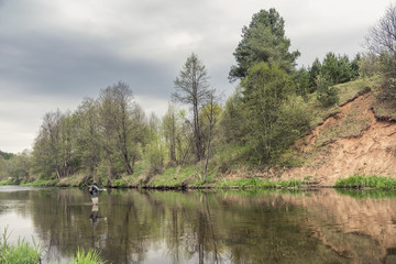 Obraz premium Fisherman casting fly rods.