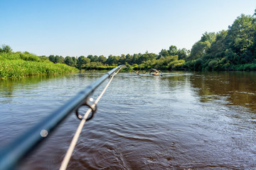 Fly fishing. Driving with the rod on the river.