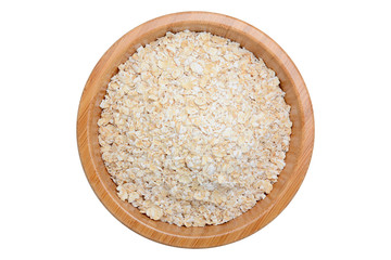 Fototapeta na wymiar oat flakes in wooden bowl isolated on white