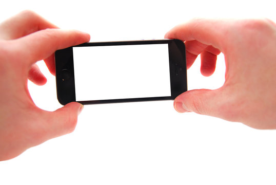 mobile phone with a white screen to insert the image in the hands of