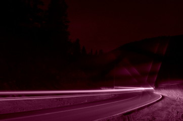 Purple car lights at night