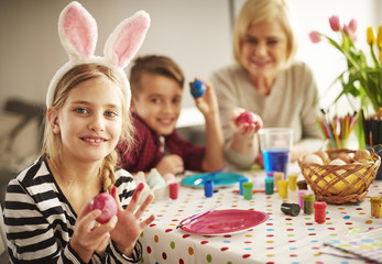 Cute blond hair girl with Easter decorations