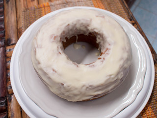 Baked Pumpkin Donut with Cream Cheese Maple Icing. Donut cake.