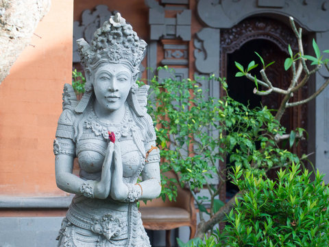 sandstone statue of woman, hindu religion statues in Bali, Indon