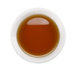 Fish sauce in white bowl isolated on background