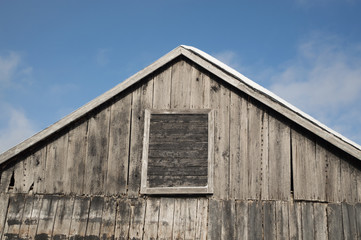Fototapeta na wymiar Side of an old farm building