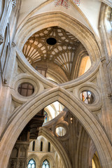 Wells, United Kingdom - August 6, 2016: St Andrew's Cross arches under the tower inside Wells Cathedral