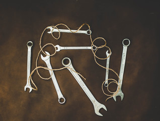 Wrenches on a brown background