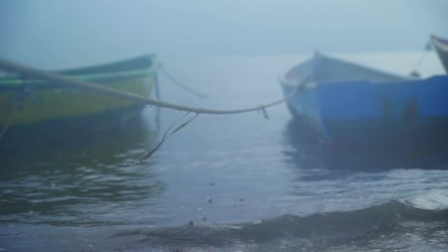 Boats on the berth in the mist