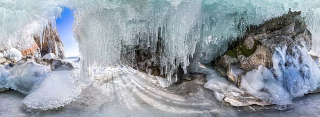 360 panorama dawn in an ice cave with icicles on Baikal, Olkhon
