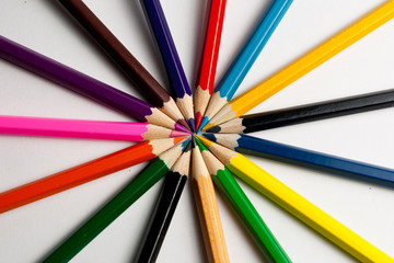 Photo of planed colored pencils on the light background