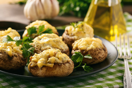 Baked Mushroom Caps Stuffed With Creams Cheese, Garlic And Herbs.