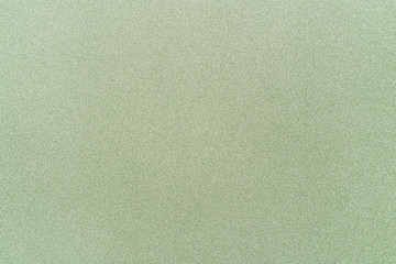 background of shiny green paper.