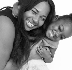 Mother And Daughter Laughing Fun Concept