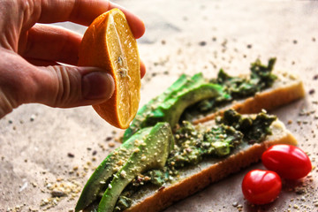 Avocado and cherry tomato toasts