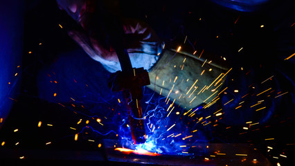 Industrial steel welder in factory technical,