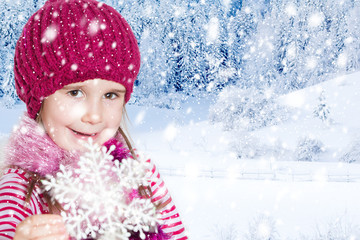 Little girl in winter clothes