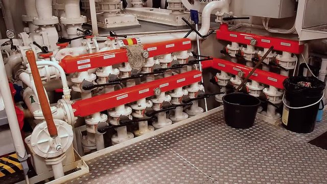 Ships valves, main engine - engineering interior. Valves in Vessel's. Engine Room Space